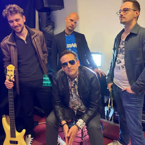 The four musicians of Rock’n’Beatz in their rehearsal room